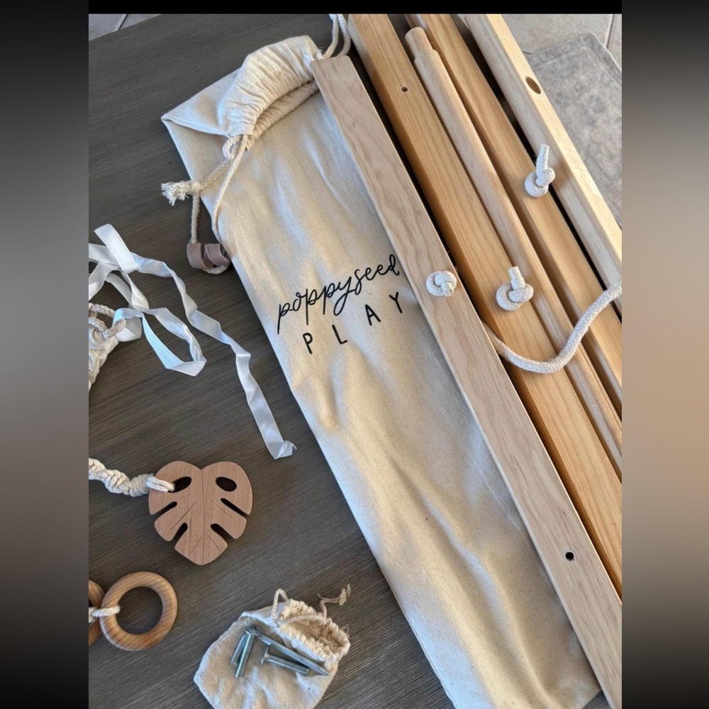 Poppyseed Play wooden play gym  with macrame hanging toys ✨